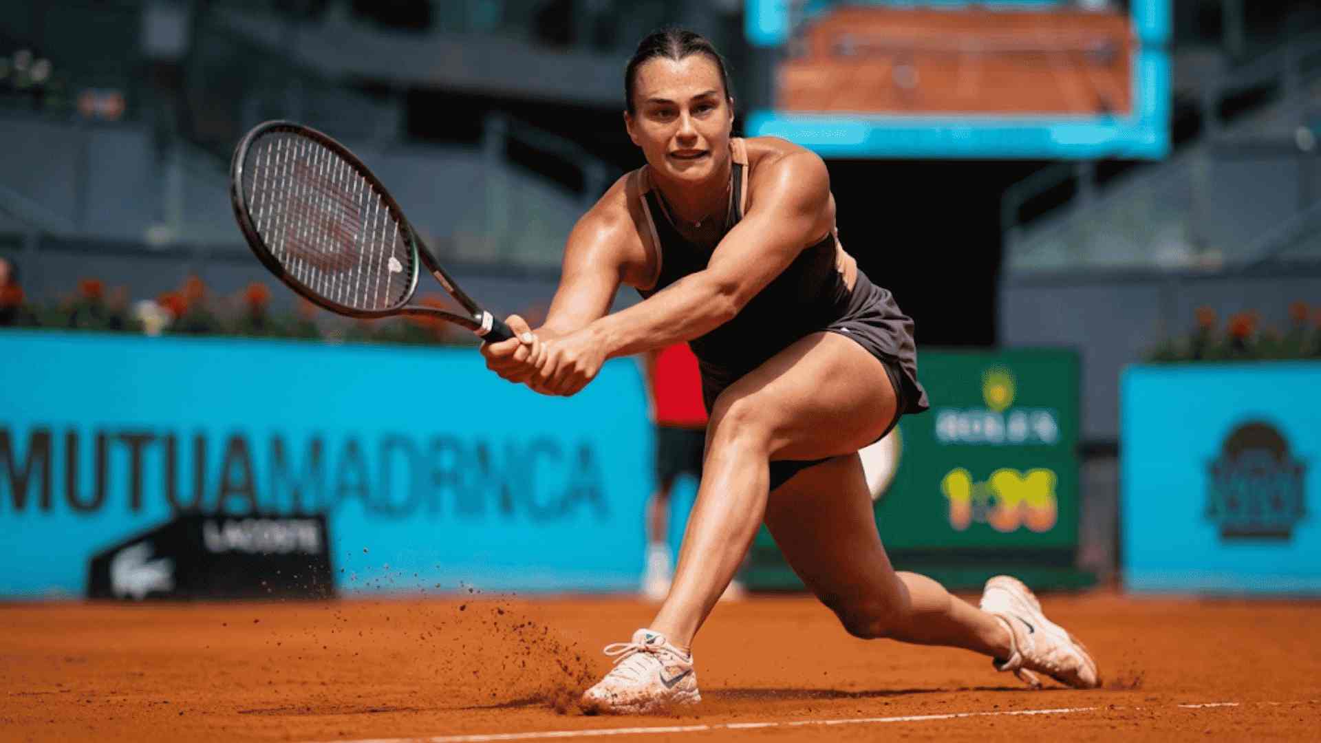 professional_female_tennis_player_hitting_a_powerful_two_handed