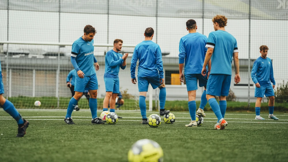 VfL Wolfsburg squad in training ahead of fixture